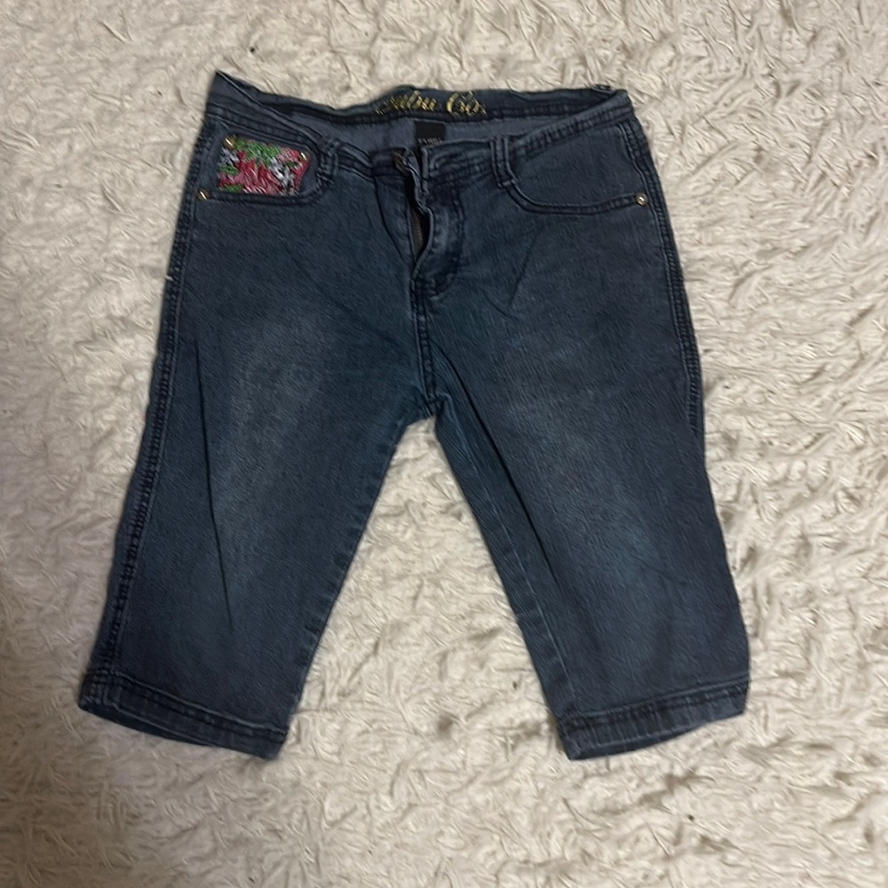 Ruby womans capri jeans.  Size 12. With colorful Floral patterns
